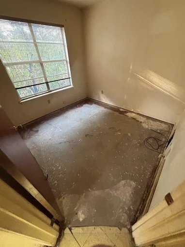 Additional room with flooring removed