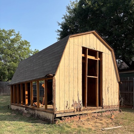 Wood shed in Arlington during demolition